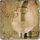 Load image into Gallery viewer, Cork back trivet with a white wine glass and text on a textured beige background