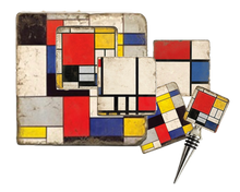 Load image into Gallery viewer, Set of four coasters, cork back trivet and bottle stopper with geometric design inspired by Piet Mondrian, primary colors accented by black and white.