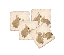 Load image into Gallery viewer, Set of four coasters with brown rabbit illustrations on a white background.