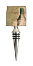 Load image into Gallery viewer, Wine bottle stopper with decorative text and wine bottle on a white background
