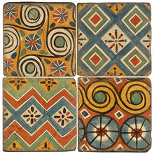 Load image into Gallery viewer, Set of four colorful coasters with geometric patterns in shades of rust, gold, green, blue and ivory.
