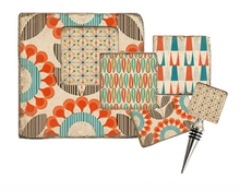 Load image into Gallery viewer, Set of orange, turquoise and brown patterned coasters on white background with a bottle stopper and trivet.
