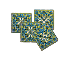 Load image into Gallery viewer, Set of four decorative coasters with green and blue floral pattern.

