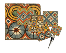 Load image into Gallery viewer, Set of four coasters, cork back trivet and bottle stopper with geometric patterns in shades of rust, gold, green, blue and ivory.
